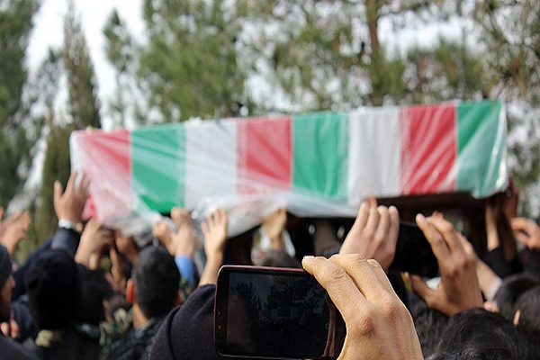گزارش تصویری از خاکسپاری شهید محمد کامران