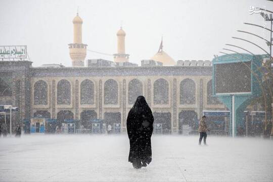 حال و هوای زائران کربلا زیر بارش باران بهاری